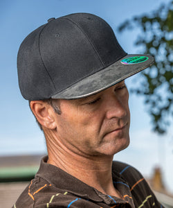 Gorra plana Bronx con purpurina y cierre snapback | Negro/Turquesa